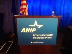 AHIP podium signage